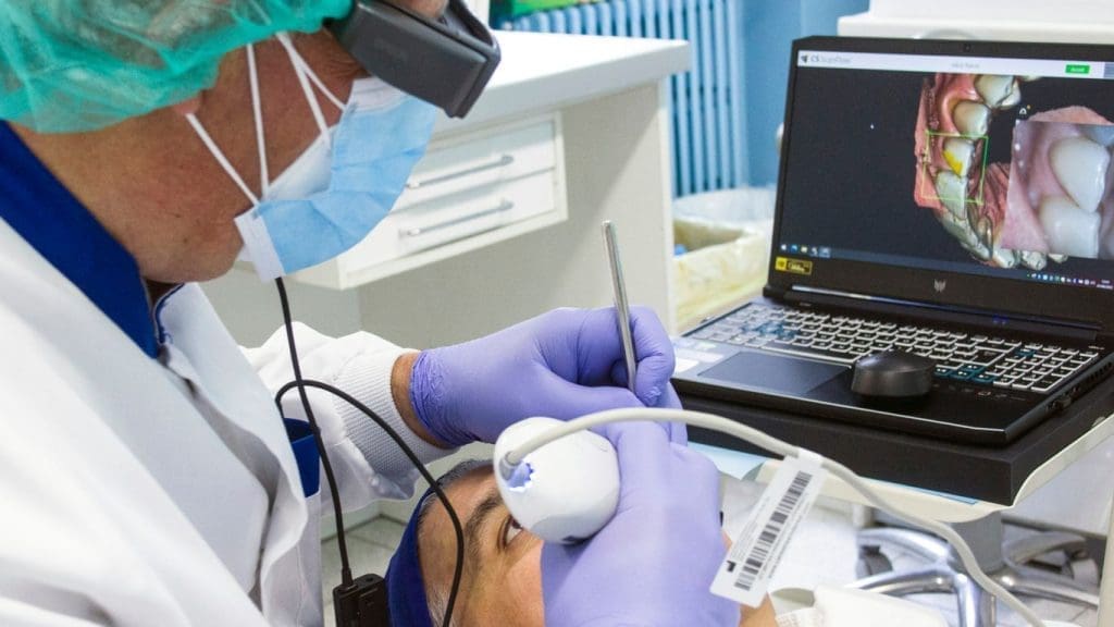 X1 Marketing Inc. | Dentist's Guide to Digital Marketing Dentist checking some teeth